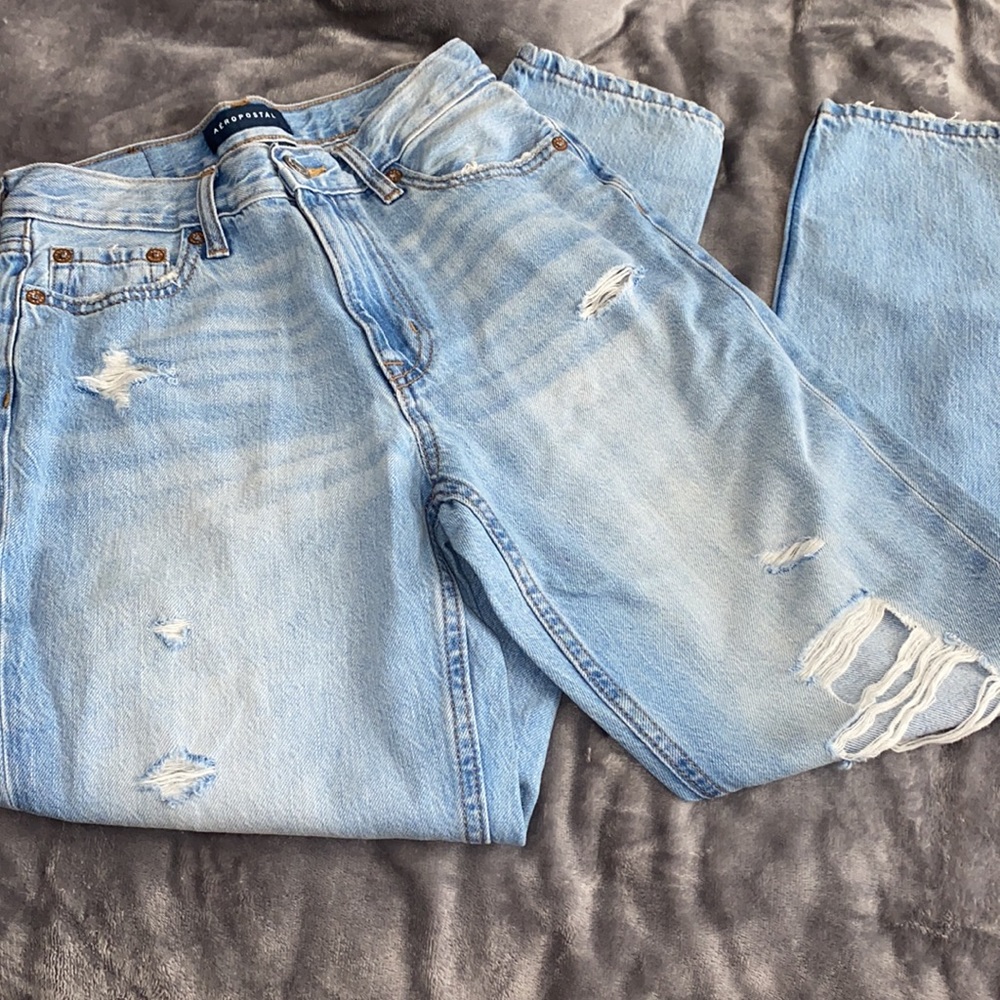 Light washed ripped mom jeans